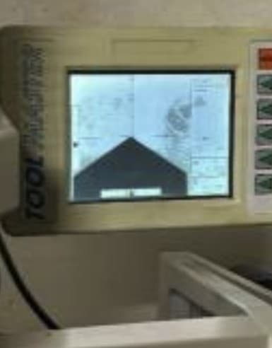 CNC machine control panel — the program is loaded and the part is ready for machining