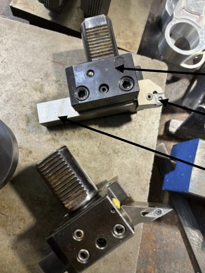 CMM measurement in progress — contact probe measuring the bored bore diameter
